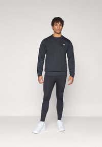 New Balance TECH CREW - Felpa - black