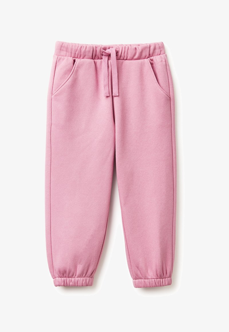 Růžové bavlněné tepláky s elastickým pasem, stahovací šňůrkou, bočními kapsami a úzkými manžetami na kotnících. Hladký povrch.