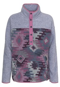 Felpa in pile con collo alto, motivo geometrico viola e grigio, dettagli rosa e patta con cinque bottoni. Tasche laterali visibili.