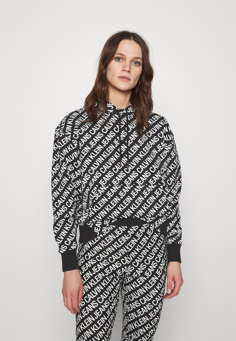 Damen Sweatshirts | Calvin Klein Jeans LOGO HOODIE Kapuzenpullover black/white/schwarz - FH95668 Damen Sweatshirts | Calvin Klein Jeans LOGO HOODIE Kapuzenpullover black/white/schwarz - FH95668