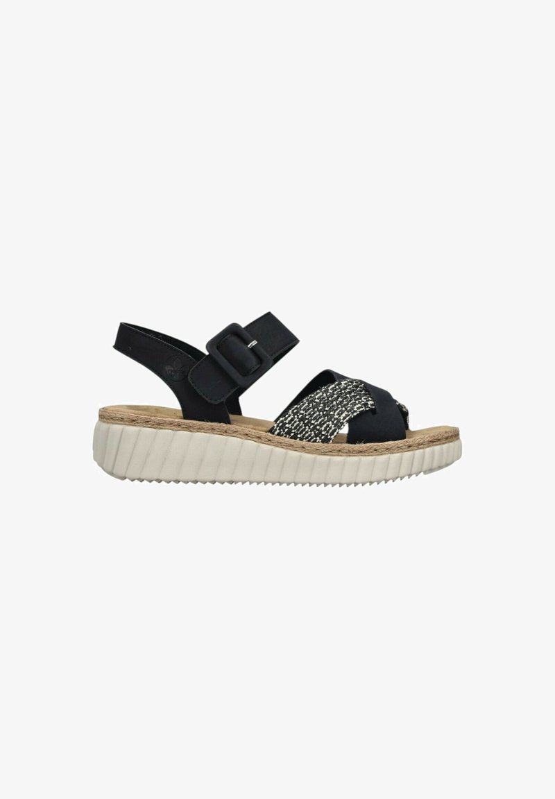 Black sandal with adjustable buckle strap, woven front strap, cushioned beige sole, and textured white rubber outsole.