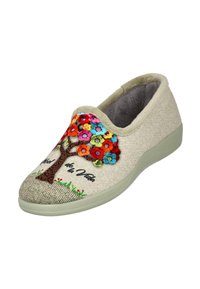 Zapatilla deslizante de tela beige con una superficie texturada, que presenta un colorido diseño de árbol bordado y el texto "Vida de la Vida". Forro suave y suela flexible.