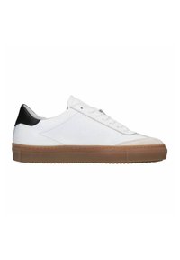 White low-top sneaker with gum sole, black heel tab, white laces, and beige suede toe cap, shown from the side on a white background.