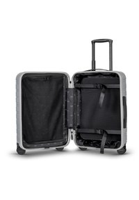 Silberner Hartschalenkoffer mit zwei Fächern. Ausgestattet mit einer schwarzen Innenauskleidung, einem Netzreißverschlussfach und verstellbaren Gurten für sicheres Packen.