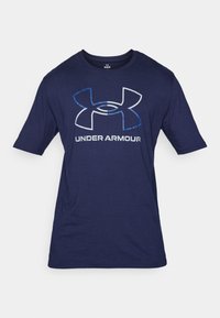 Navy blue Under Armour short-sleeve t-shirt with large logo and brand name in white and blue on front, size medium.
