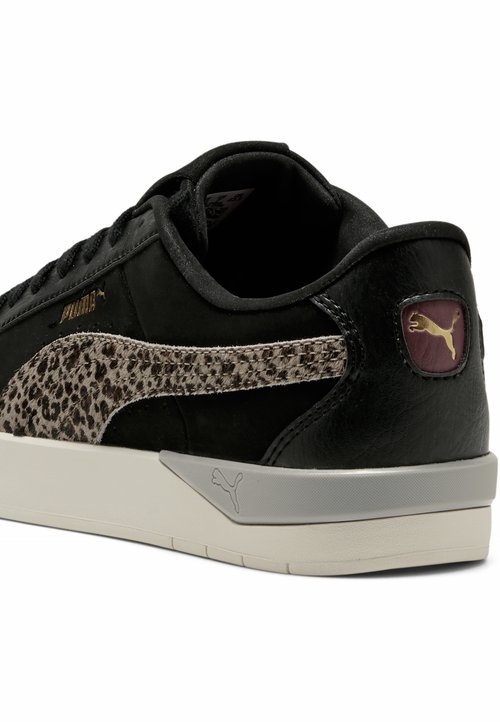 PUMA Trainers - black- gold-team regal red — photo 4