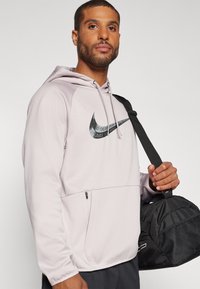 Nike Performance HOODIE - Jersey con capucha - platinum violet/black