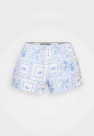 Biele šortky s modrým kvetinovým potlačením a štvorcovými vzormi. Elastický pás s logom "Hollister". Ľahký materiál, voľný strih.