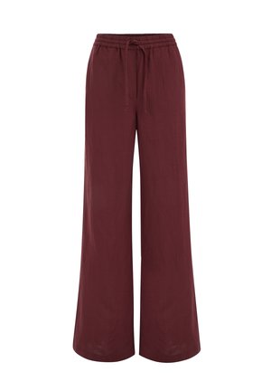 Pantalon large bordeaux avec ceinture élastique et cordon de serrage ajustable, offrant une coupe décontractée et un tissu doux.