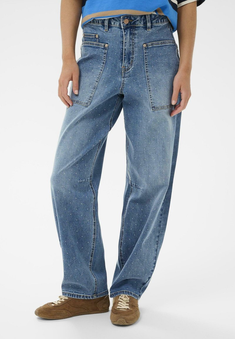 Light blue denim jeans with a loose fit, featuring a high waist, two front pockets, and a subtle speckled texture.