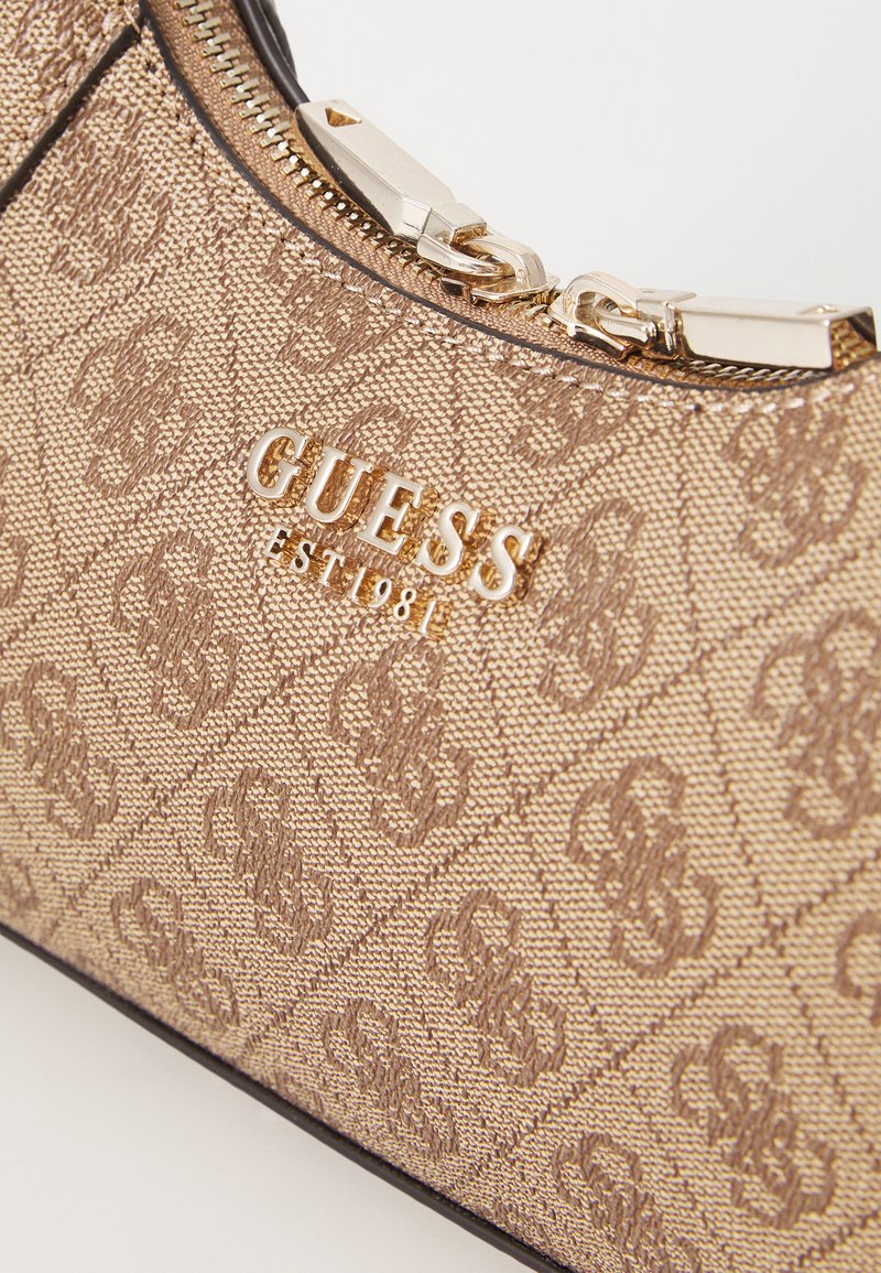 Katya Crossbody Top Tas GUESS Katya Crossbody Top Met Ritssluiting Voor Dames, Latte-logo, Eén Maat Latte Logo Tas