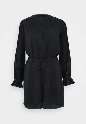 Vestito nero con scollatura rotonda, maniche lunghe in tessuto trasparente plissettate, vita con cordoncino e polsini a campana. Tessuto liscio con una finitura leggera.