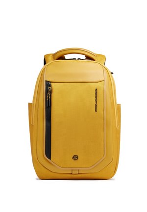 Yellow compact backpack with front zippered pocket, padded top handle, and side compartments, designed for daily use and travel.