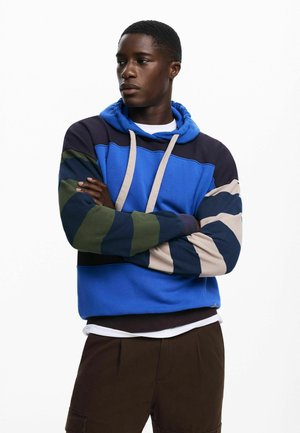 Colorful hoodie featuring shades of blue, green, dark navy, and beige. It has a drawstring hood and wide striped sleeves with a regular fit.