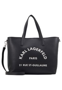 Czarna torba typu tote Karl Lagerfeld z dwoma uchwytami, odpinanym paskiem na ramię i białym napisem "Karl Lagerfeld Paris 21 Rue St-Guillaume."