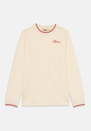 Cream long-sleeve T-shirt in soft cotton, featuring a round neck with red trim and matching cuffs. "Ellesse" logo in red embroidery on chest.