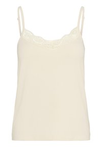 Luksusinen beige toppi säädettävillä ohuilla olkaimilla, jossa on sahalaitainen pitsireuna kaula-aukossa. Pehmeä puuvillasekoitusmateriaali.