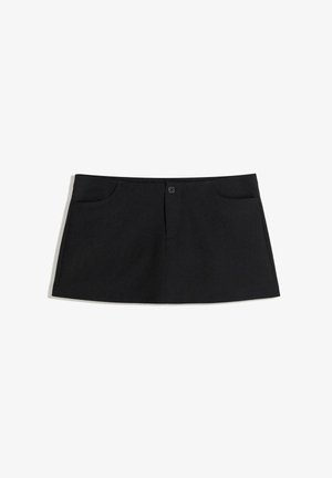 Black, knee-length skirt made of soft fabric. Features two front pockets and a single button closure at the waist.