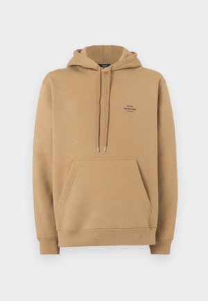 Felpa con cappuccio color sabbia in cotone, dotata di tasca frontale, polsini a costine e un piccolo logo sul petto. Presenta un cappuccio con cordoncino e una texture morbida.