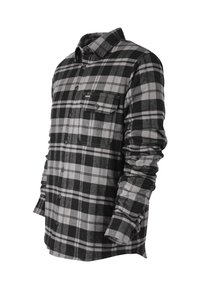 Camicia di flanella a quadri nera e grigia con maniche lunghe, chiusura a bottoni sul davanti, tasca sul petto e leggera texture. Classico motivo a scacchi.