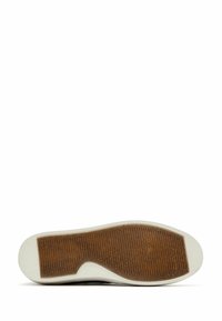 Sole di scarpa in materiale gommoso, con scanalature in rilievo di colore marrone, bordate da un bordo bianco. Design piatto adatto per un abbigliamento informale.