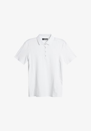 Polo bianco con un delicato motivo a onde, maniche corte e chiusura a tre bottoni. Realizzato in tessuto morbido e leggero.