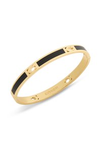 Bracelet rigide en ton or avec une incrustation en émail noir, design rectangulaire, avec des accents circulaires et un logo gravé à l'intérieur.