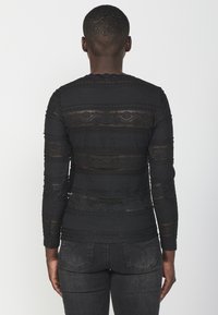Koroshi Blūze - black