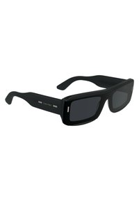 Black rectangular sunglasses with a glossy finish, featuring silver accents on the temples and thick frames. Lenses are dark, providing UV protection.