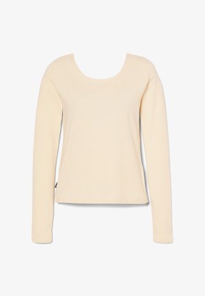 Langsleeve top gemaakt van zachte, lichtbeige stof. Beschikt over een ronde halslijn en een rechte snit, zonder zichtbare patronen of accenten.