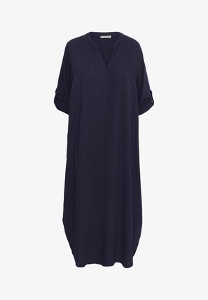 Robe bleu marine avec un décolleté en V, des manches courtes retroussées et une coupe décontractée. Fabriquée dans un tissu lisse et léger avec une texture subtile.