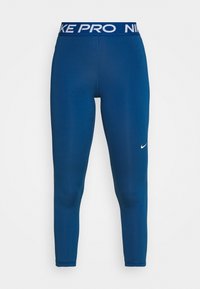 Blå Nike Pro leggings med en åtsittande design, elastisk midja med texten "NIKE PRO" och en liten vit Nike-logotyp på underbenet.