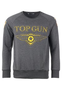 Szary sweatshirt z napisem "TOP GUN" na żółto, z grafiką skrzydła i gwiazdy. Wykonany z miękkiego, teksturowanego materiału; z prążkowanym wykończeniem rękawów i brzegu.