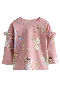 Chemise à manches longues en tissu rose doux avec un motif floral et de fées fantaisiste. Des accents en volants sur les manches rehaussent le design.