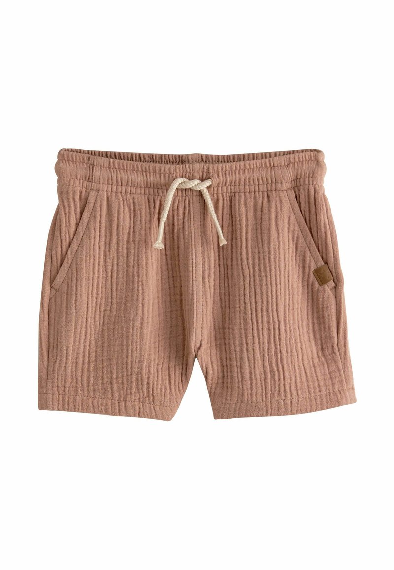 Shorts en mélange de coton de couleur rose clair, avec un design texturé à côtes, une taille élastique avec cordon de serrage et des poches latérales.
