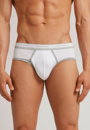 Witte herenslip met grijze bies, voorzien van een snug fit, elastische tailleband met "intimissimi" branding en een gladde katoenstructuur.