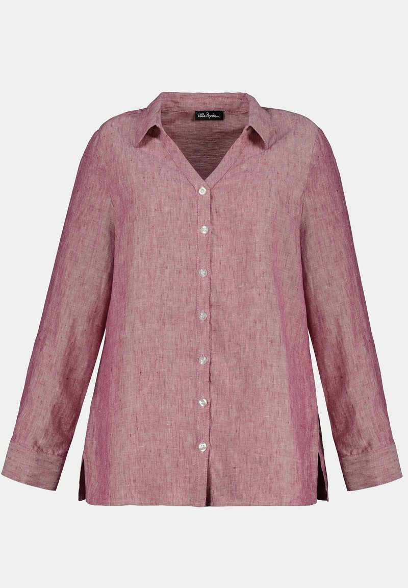 Camicia in lino botton-up in una sfumatura di rosa chiaro, con scollo a V, maniche lunghe e spacchi laterali. Presenti bottoni trasparenti lungo il davanti.