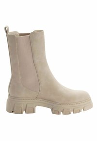 Beige kotníkové boty s texturovaným koženým svrškem a elastickými bočními panely. Masivní gumová podrážka s rýhovaným vzorem pro lepší přilnavost.