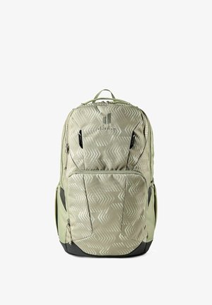 Sac à dos Deuter vert clair avec motif géométrique flèche, plusieurs compartiments zippés et détails noirs.