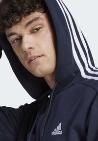 adidas Sportswear ESSENTIALS 3-STRIPES FULL-ZIP - Cipzáras pulóver - legend ink   white