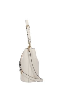 Bucket bag in textured beige leather, featuring a detachable strap, gold-tone hardware, and contrasting black accents.