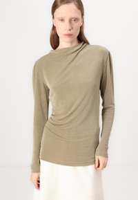 Long-sleeve, olive green top made of soft fabric, featuring a draped design with side ruching and a high neckline. Smooth texture, fitted silhouette.