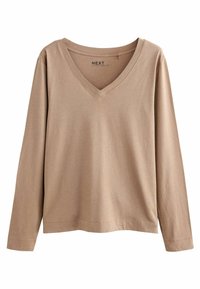 Långärmad topp med V-hals i ljusbrunt tyg, med mjuk textur och rak skärning. Textiletiketten inuti halsringningen säger "NEXT".