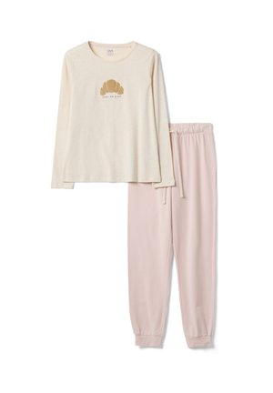 Camiseta crema de manga larga con gráfico de croissant y pantalones jogger rosa con cintura elástica, tendidos planos sobre fondo blanco.