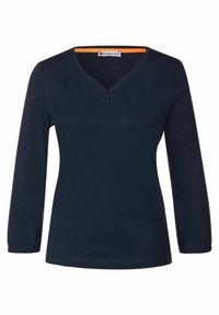 Mörkblå långärmad topp med V-ringning och tvåknäppning, som har rynkade ärmslut och en mjuk, slät tygtextur.