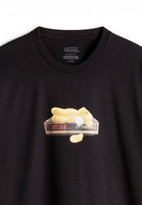 Black t-shirt featuring a graphic of a yellow teddy bear lying on a digital clock, displaying red numbers "19:66" beneath.