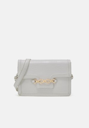Bandolera - white