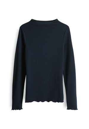 Top a maniche lunghe di colore navy con dettaglio a coste, scollatura rotonda e orlo ondulato. Il tessuto ha un aspetto morbido e testurizzato.