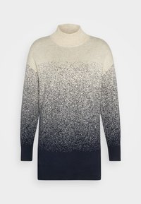 Pull en maille à manches longues avec col montant, doté d'un motif dégradé allant du crème en haut au bleu marine foncé en bas.