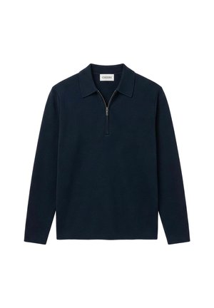 Marineblå langermet strikket genser med krage og halvlange glidelås foran, merket "CISZERE" inne i kragen.